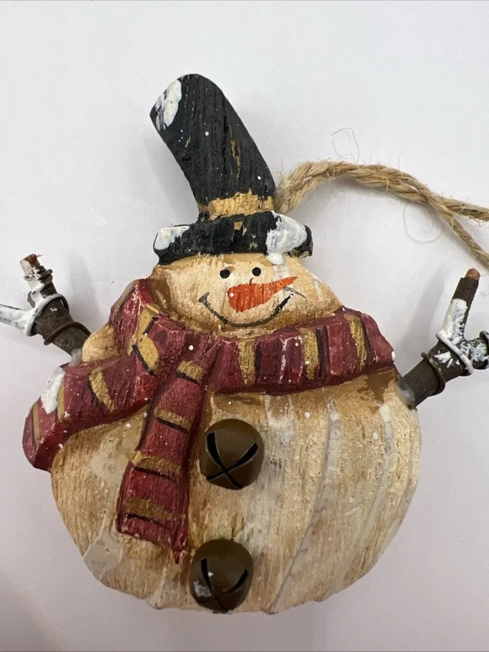 This Rustic Primitive Folk Art Snowman figurine is a charming addition to any Ch